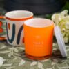 Candela Fluo Orange e Poppies e Amalfi Citrus Mercury in Vetro con Coperchio